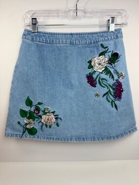 H&M x Coachella Light Blue Denim Mini Skirt with Floral Embroidery
